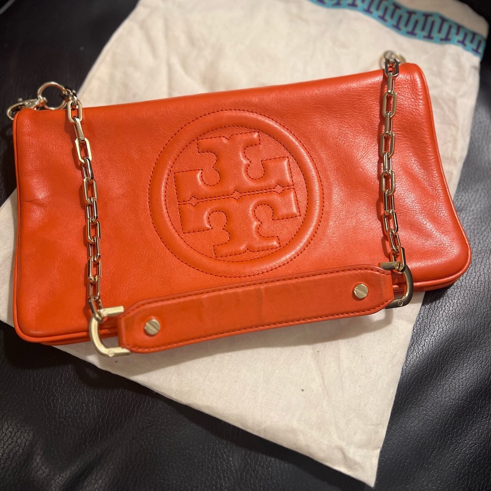 Tory Burch Bombé Riva Clutch With Detachable Gold Strap.
